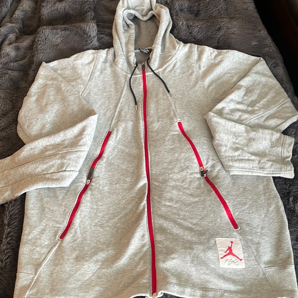 Jordan Flight brand Men’s XL grey zip up long sleeve hoodie with red trim.